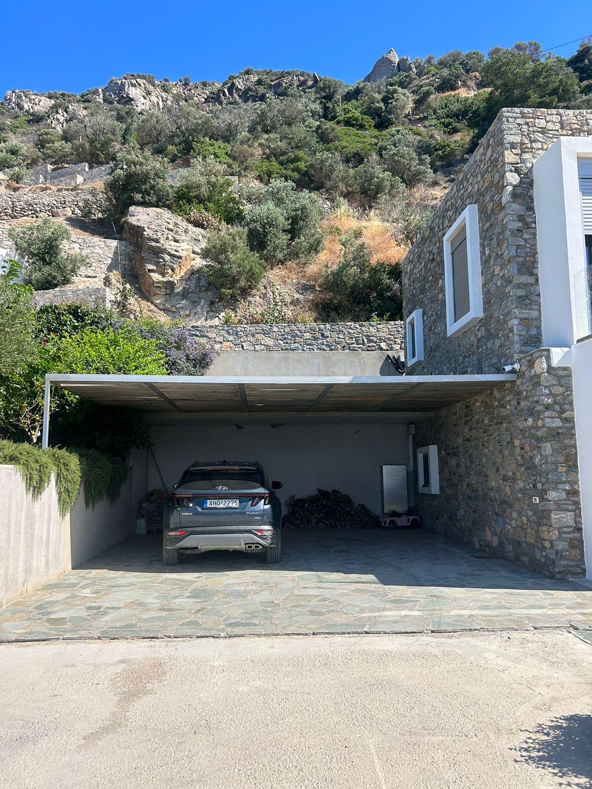 Two covered parking bays at Sunset Cliff Villa