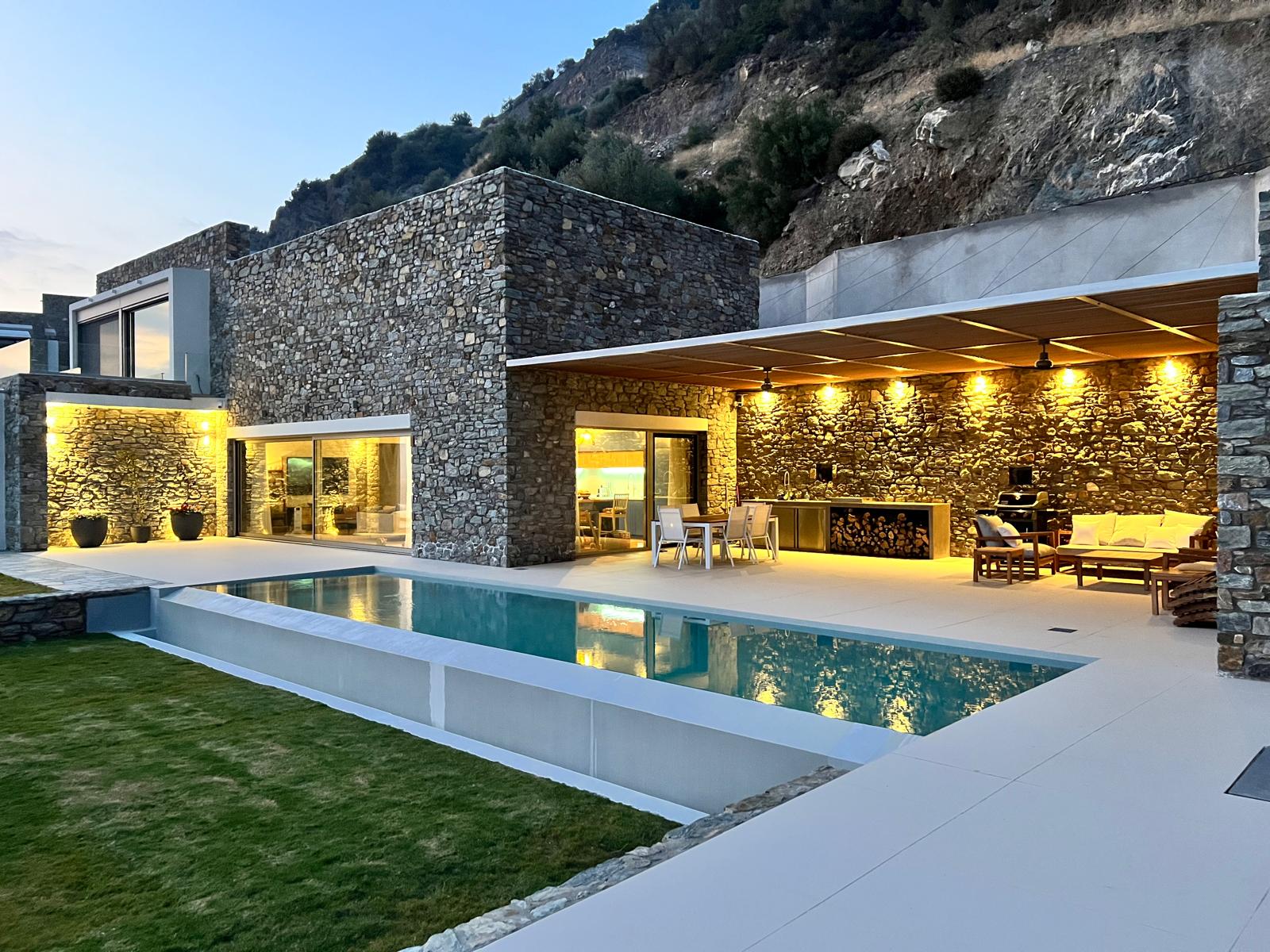 Sunset Cliff Villa pool and pergola at dusk