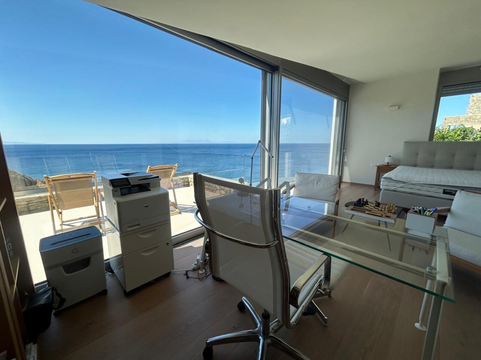 Master suite study and sitting area, with the bed visible behind